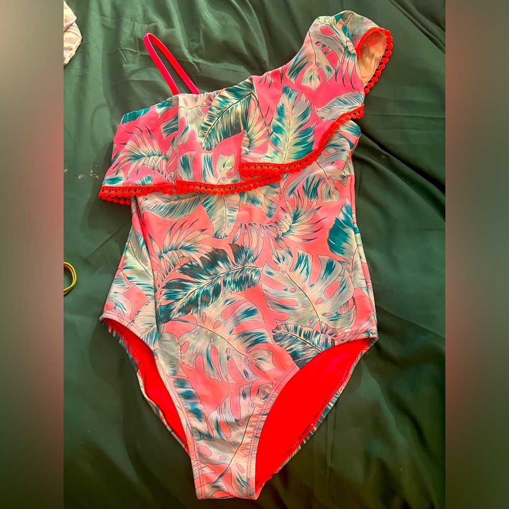 Girls swimsuit size 16 tropical plants on pink background